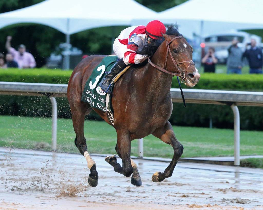 thoroughbred omaha beach races on a sloppy track